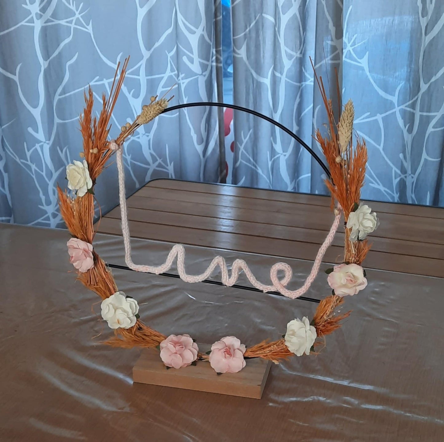 Bloemenring met gepunnikte naam